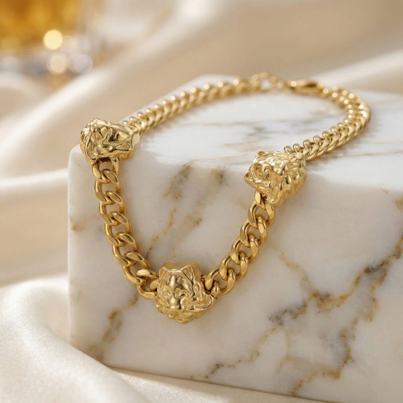 A stylish gold bracelet made of rust-resistant stainless steel, with a wide chain design and three luxurious prominent tiger-shaped heads, with an adjustable clasp to fit you. - Image 4